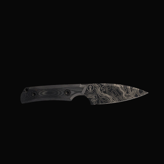 Black knife with a detailed blade on a white background